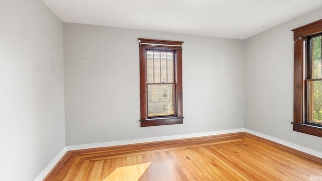 524 Byron St, Huntington, IN 46750 - empty room with baseboards and hardwood / wood-style floors