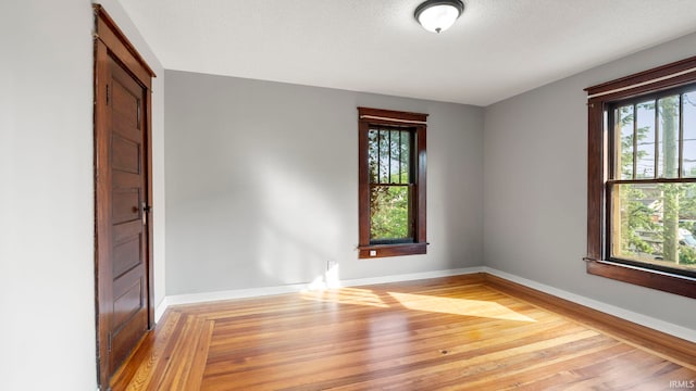 524 Byron St, Huntington, IN 46750 - empty room with light wood-type flooring and baseboards