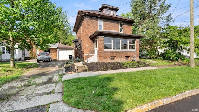 524 Byron St, Huntington, IN 46750 - traditional style home featuring brick siding, driveway, a front yard, a garage, and an outbuilding