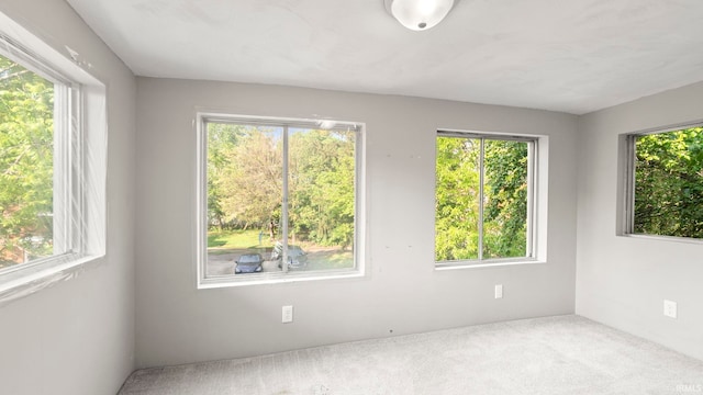 524 Byron St, Huntington, IN 46750 - spare room with healthy amount of natural light and carpet flooring