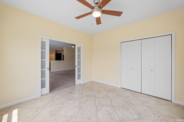 4300 Lithophone Ct, West Lafayette, IN 47906 - unfurnished bedroom featuring french doors, a closet, baseboards, ceiling fan, and light tile patterned flooring