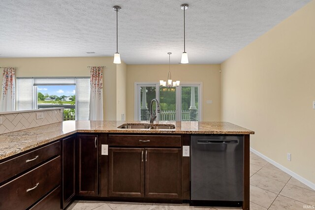 4300 Lithophone Ct, West Lafayette, IN 47906 - kitchen with dishwashing machine, a sink, plenty of natural light, light stone counters, and a textured ceiling