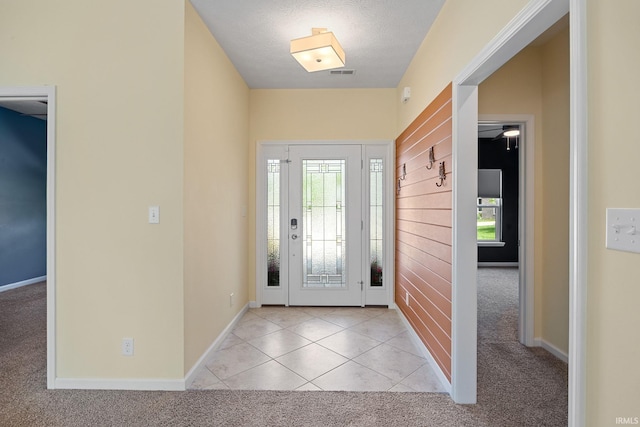 4300 Lithophone Ct, West Lafayette, IN 47906 - carpeted entryway featuring baseboards and tile patterned flooring