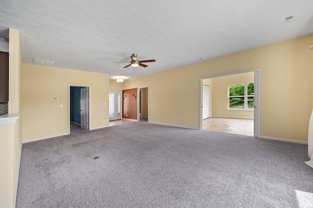 4300 Lithophone Ct, West Lafayette, IN 47906 - unfurnished living room with carpet, ceiling fan, and baseboards