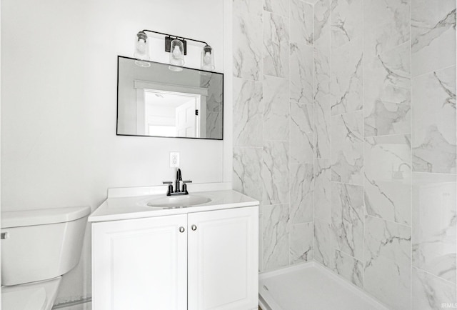 110 N Sheridan St, Kendallville, IN 46755 - bathroom featuring toilet, vanity, and tiled shower