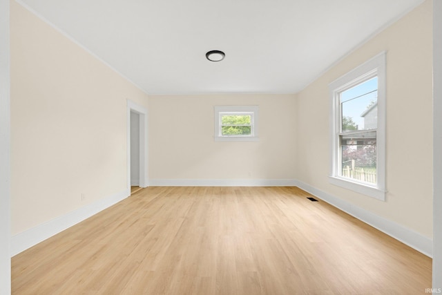 110 N Sheridan St, Kendallville, IN 46755 - spare room with light wood-style floors and baseboards