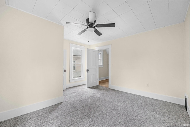 110 N Sheridan St, Kendallville, IN 46755 - unfurnished room featuring carpet flooring, baseboards, and ceiling fan