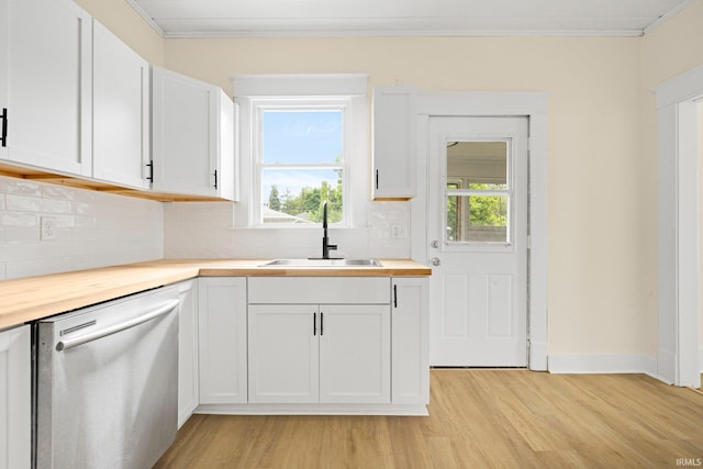 110 N Sheridan St, Kendallville, IN 46755 - kitchen with a sink, dishwasher, butcher block counters, light wood-style floors, and tasteful backsplash