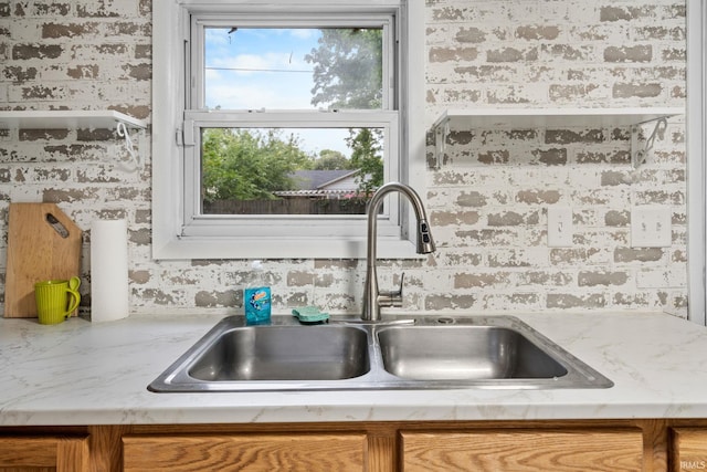 1310 Oak Ave, Lafayette, IN 47905 - kitchen featuring a sink and brown cabinetry