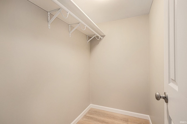 930 Oak Ridge Dr, South Bend, IN 46617 - spacious closet featuring light wood-style floors