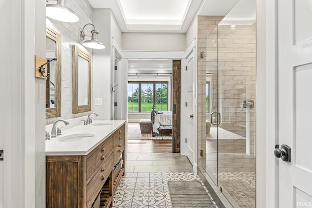 5847 Augusta Blvd, West Lafayette, IN 47906 - ensuite bathroom with double vanity, a shower stall, and tile patterned floors