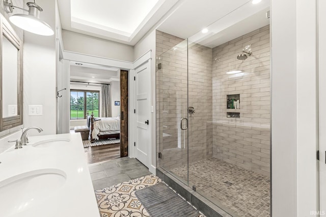 5847 Augusta Blvd, West Lafayette, IN 47906 - full bath with a shower stall, double vanity, ensuite bathroom, tile patterned flooring, and recessed lighting