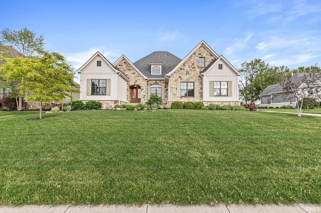 5847 Augusta Blvd, West Lafayette, IN 47906 - view of front of home with board and batten siding, a front lawn, and stone siding