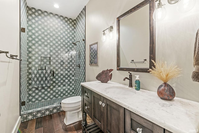 5847 Augusta Blvd, West Lafayette, IN 47906 - bathroom with vanity, toilet, wood finished floors, and a stall shower