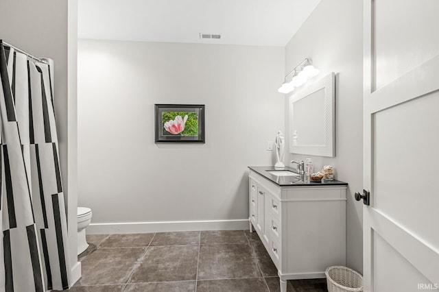 5847 Augusta Blvd, West Lafayette, IN 47906 - bathroom with vanity, toilet, and baseboards