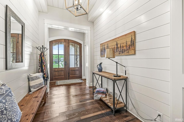 5847 Augusta Blvd, West Lafayette, IN 47906 - foyer with arched walkways, dark wood-style flooring, a chandelier, and wooden walls