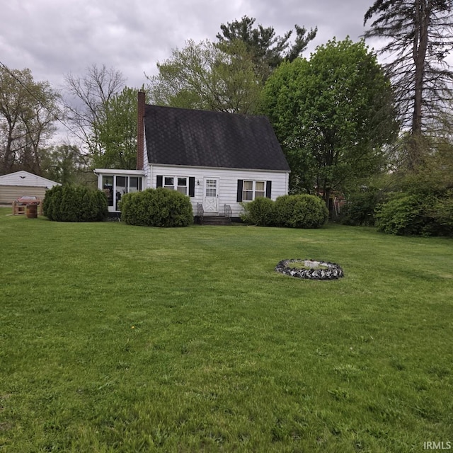 11544 Lincolnway Hwy, Osceola, IN 46561 - view of front of property featuring a front yard and a chimney