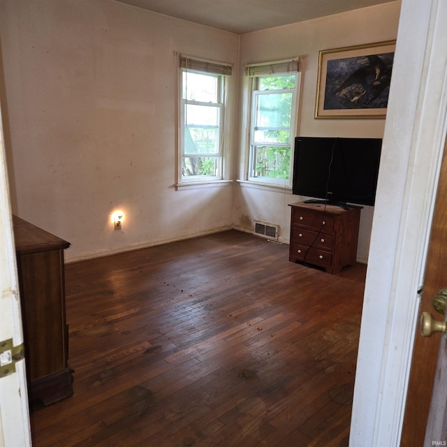 11544 Lincolnway Hwy, Osceola, IN 46561 - unfurnished bedroom featuring dark wood-style floors and baseboards