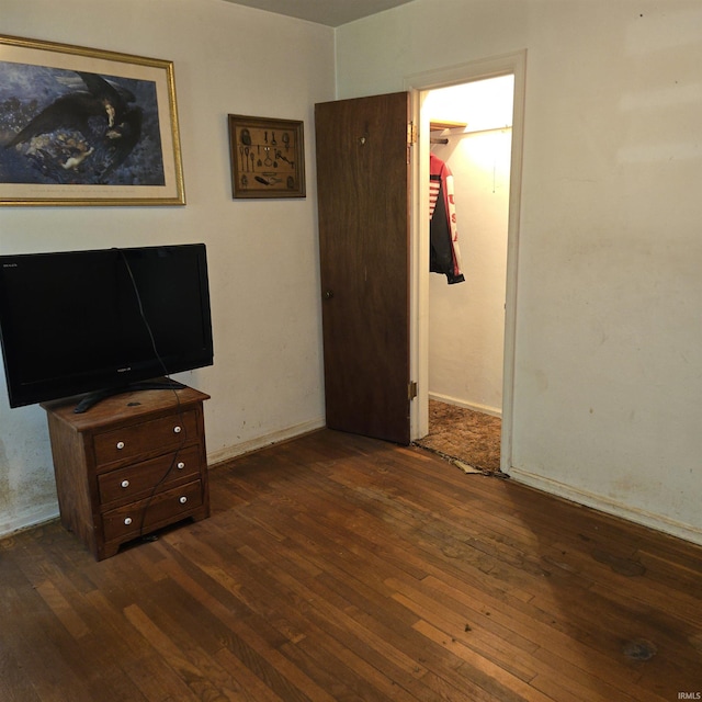 11544 Lincolnway Hwy, Osceola, IN 46561 - bedroom featuring hardwood / wood-style flooring, baseboards, and a spacious closet