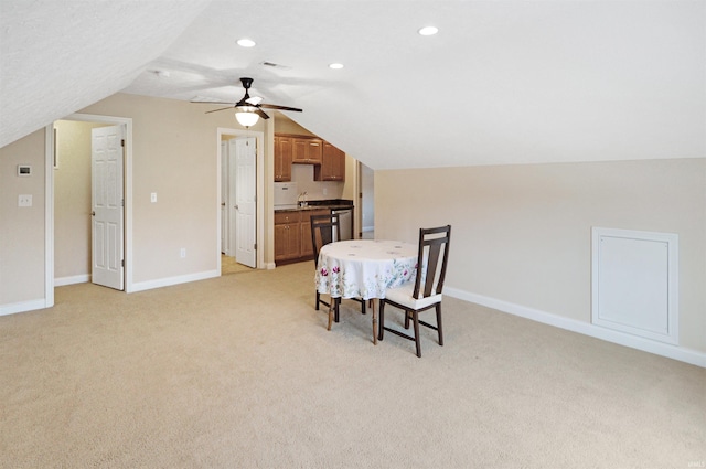 1632 Solemar Dr, West Lafayette, IN 47906 - dining area with vaulted ceiling, light carpet, baseboards, a ceiling fan, and recessed lighting