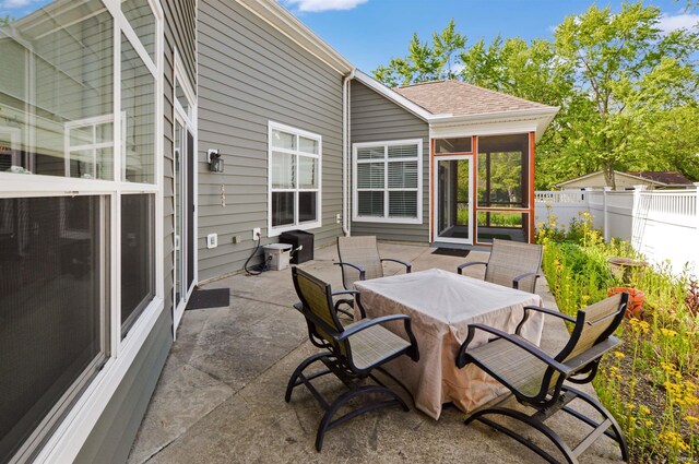 1632 Solemar Dr, West Lafayette, IN 47906 - view of patio / terrace with a sunroom and outdoor dining area