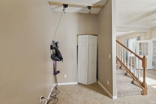 2000 Vinton St, Lafayette, IN 47904 - carpeted foyer with stairway, baseboards, and ceiling fan