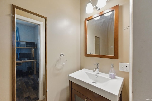 2000 Vinton St, Lafayette, IN 47904 - bathroom featuring vanity and wood finished floors