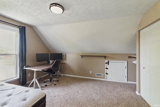 2000 Vinton St, Lafayette, IN 47904 - carpeted home office with a textured ceiling, vaulted ceiling, and baseboards