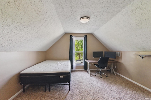 2000 Vinton St, Lafayette, IN 47904 - bedroom with a textured ceiling, baseboards, vaulted ceiling, carpet, and an office area