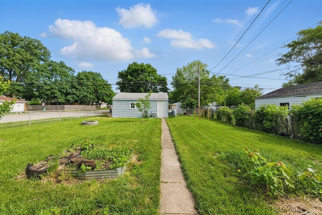 2000 Vinton St, Lafayette, IN 47904 - view of yard featuring an outbuilding and a vegetable garden
