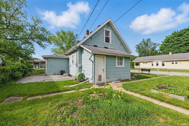 2000 Vinton St, Lafayette, IN 47904 - rear view of house with central air condition unit and a shingled roof