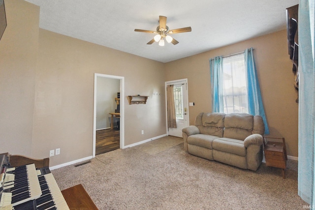 2000 Vinton St, Lafayette, IN 47904 - living area with ceiling fan, carpet floors, and baseboards