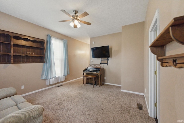 2000 Vinton St, Lafayette, IN 47904 - living room featuring ceiling fan, carpet, and baseboards