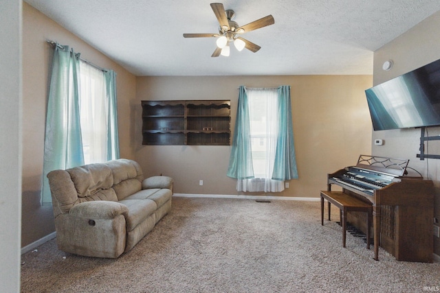 2000 Vinton St, Lafayette, IN 47904 - sitting room featuring healthy amount of natural light, ceiling fan, carpet, and baseboards