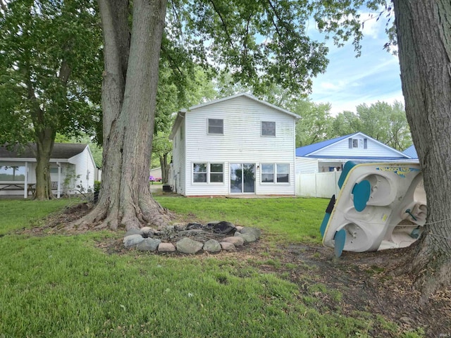 42 W Lakeside Dr, North Manchester, IN 46962 - rear view of house with an outdoor fire pit