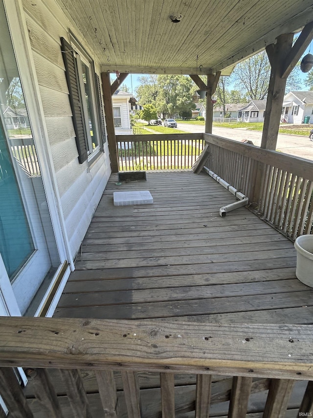 839 E 5th St, Mishawaka, IN 46544 - wooden porch with a residential view