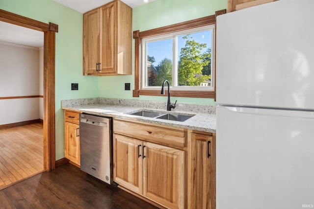 2509 Main St, Lafayette, IN 47904 - kitchen featuring freestanding refrigerator, dishwasher, a sink, dark wood finished floors, and light stone counters
