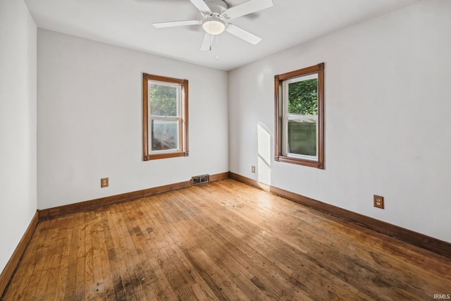 2509 Main St, Lafayette, IN 47904 - spare room featuring hardwood / wood-style flooring, baseboards, and a ceiling fan