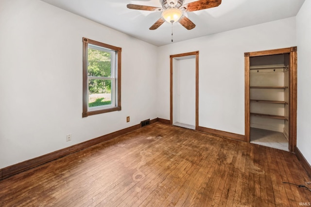 2509 Main St, Lafayette, IN 47904 - unfurnished bedroom with wood-type flooring, baseboards, and ceiling fan
