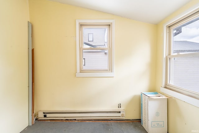 244 N Miami St, Wabash, IN 46992 - unfurnished room featuring a baseboard radiator, vaulted ceiling, and concrete flooring