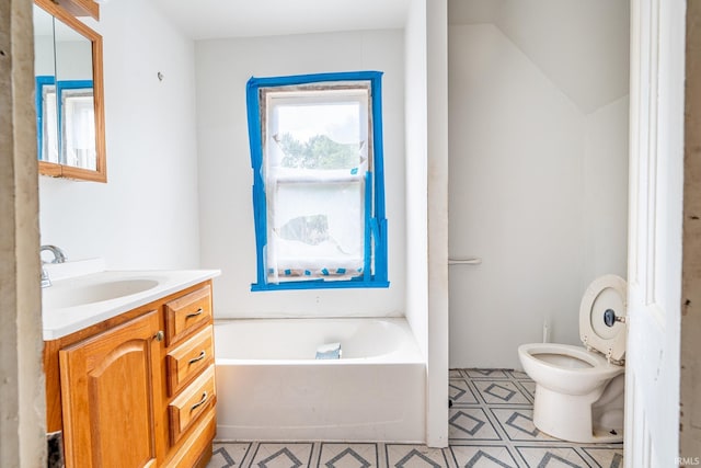 244 N Miami St, Wabash, IN 46992 - bathroom featuring a bath, vanity, toilet, and tile patterned flooring