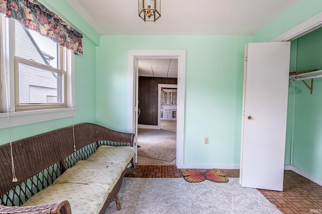 244 N Miami St, Wabash, IN 46992 - unfurnished bedroom featuring brick patterned floors, baseboards, and a closet