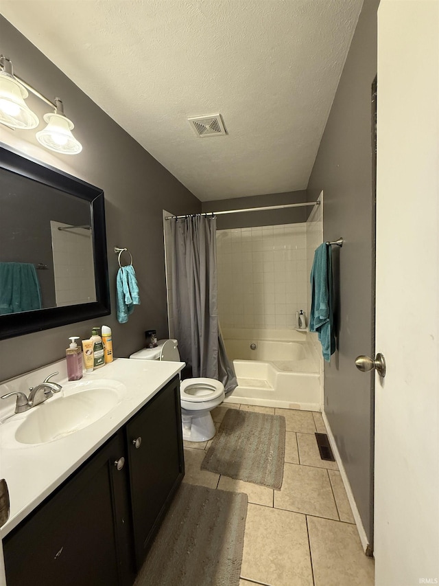 703 Downey Ave, Mishawaka, IN 46544 - bathroom featuring tile patterned flooring, vanity, shower / bathtub combination with curtain, toilet, and a textured ceiling