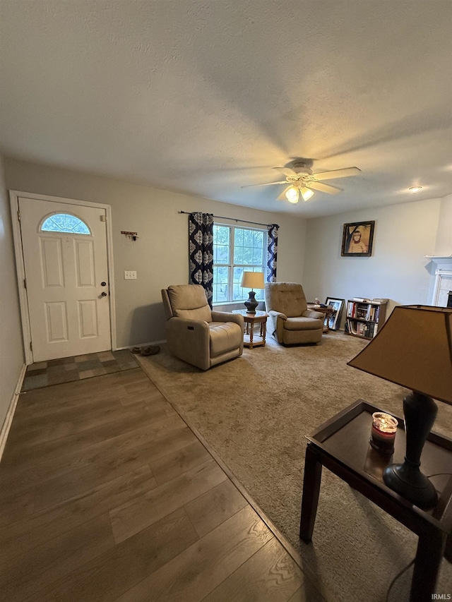 703 Downey Ave, Mishawaka, IN 46544 - living area featuring ceiling fan and dark wood-style floors