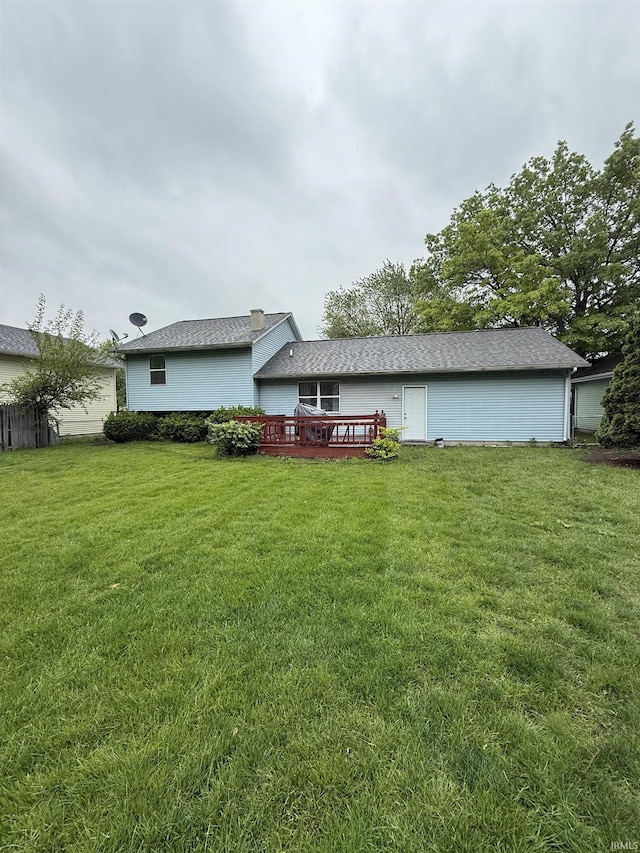 703 Downey Ave, Mishawaka, IN 46544 - back of house featuring a yard and a deck