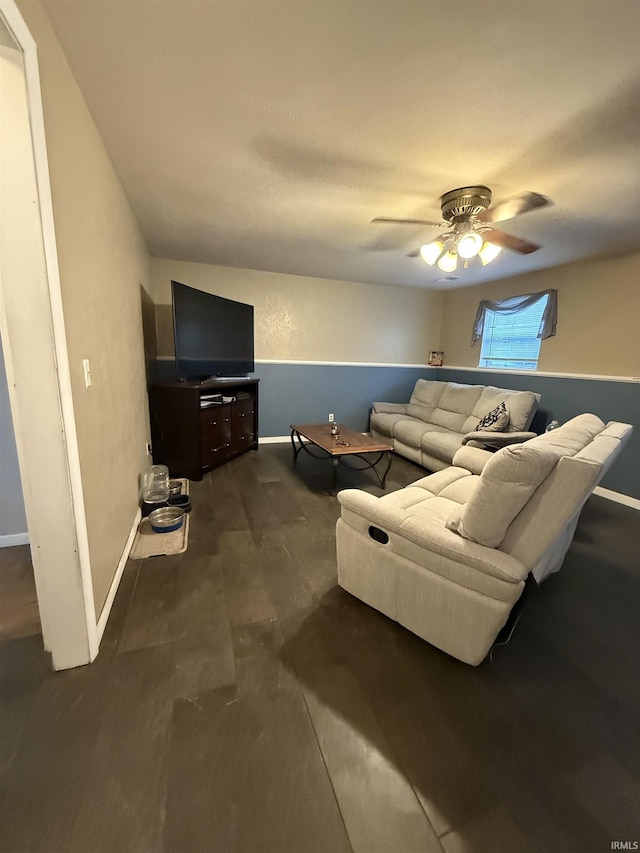 703 Downey Ave, Mishawaka, IN 46544 - living area with a ceiling fan and baseboards