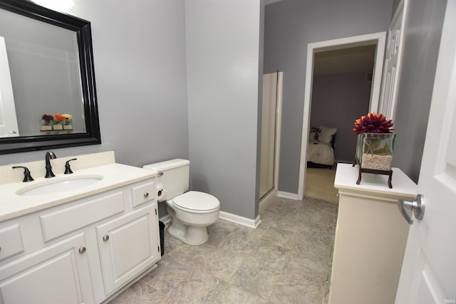 9763 S Harbour Pointe Dr Unit 34, Bloomington, IN 47401 - bathroom featuring vanity, toilet, a shower, and baseboards