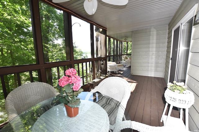 9763 S Harbour Pointe Dr Unit 34, Bloomington, IN 47401 - sunroom / solarium featuring a ceiling fan and outdoor dining space