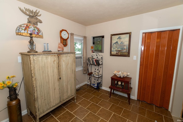 536 Garfield St, Osceola, IN 46561 - entryway with baseboards and dark tile patterned floors