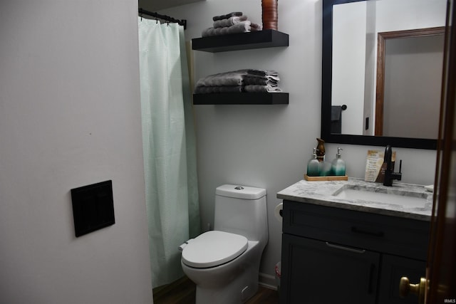 2329 Glenwood Ave, Fort Wayne, IN 46805 - full bathroom with vanity, toilet, a shower with curtain, and wood finished floors